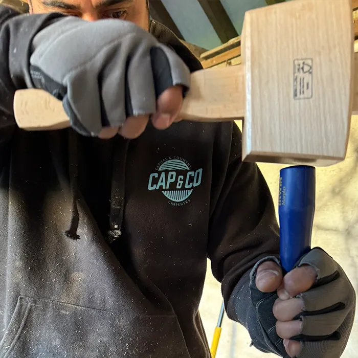 Joiner working on window